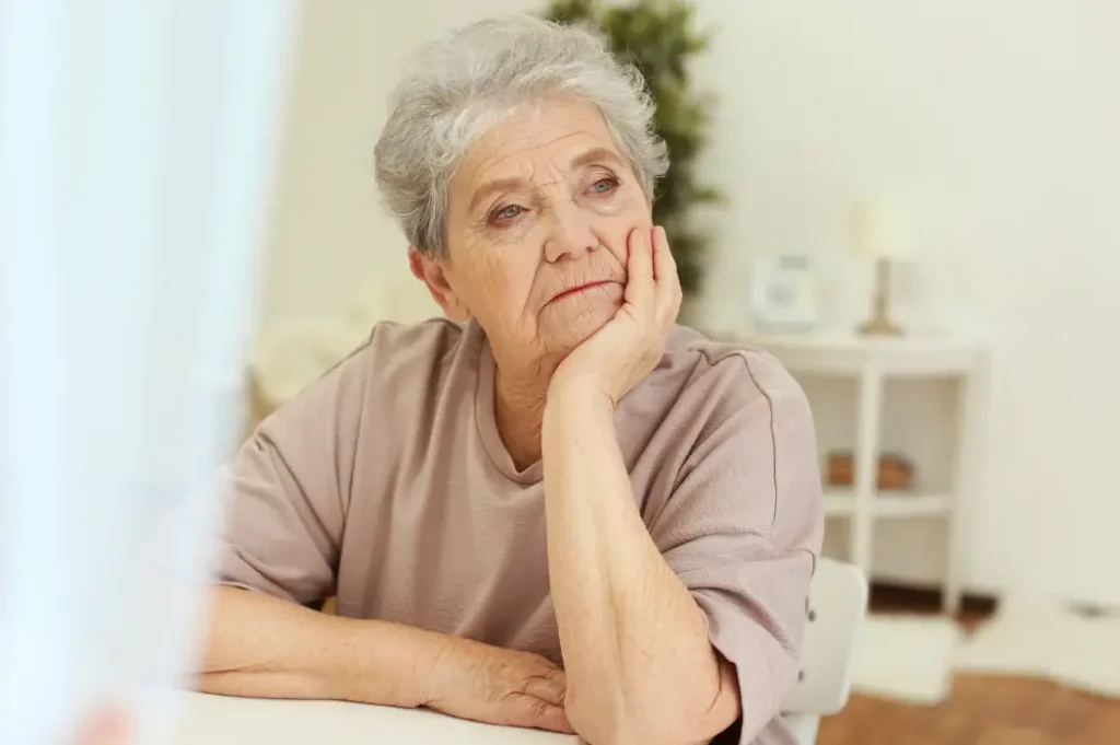 an elderly woman looking from afar